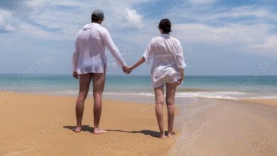 Photo of While Relaxing on the Beach with My Husband, a Woman Approached, Knelt Down, and Spoke His Name
