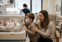 Photo of My Son Came to Meet His Baby Sister in the NICU—Then He Whispered What His Dad Had Told Him at Home
