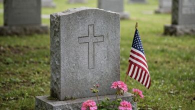 Photo of A Stranger Was Waiting Beside My Husband’s Grave. What He Gave Me Led Straight Back to Our Garage.